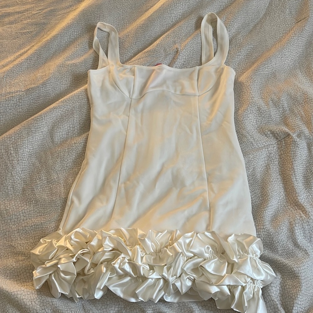 White mini dress with 3D ruffle hem
